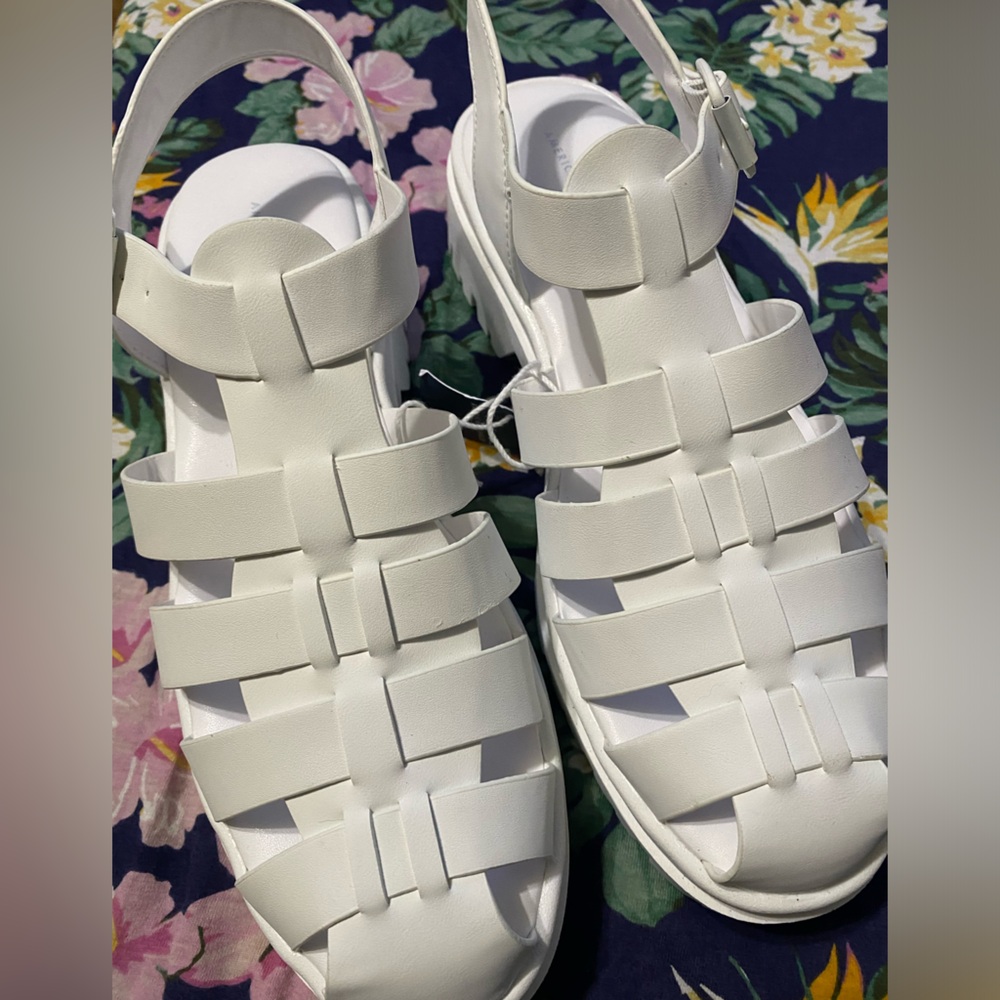 White sandals. Comfy , never worn. With tags.